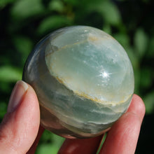 Load image into Gallery viewer, Lemurian Aquatine Calcite Crystal Sphere

