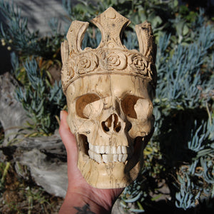 Carved Human Skull with Crown in Wood with Bone Teeth