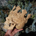 Carved Human Skull with Crown in Wood with Bone Teeth