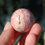 Rhodochrosite Crystal Gemstone Sphere