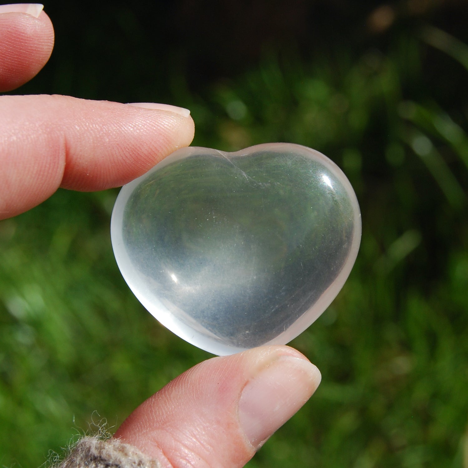 Girasol Clear Quartz Heart Shaped Crystal Palm Stone