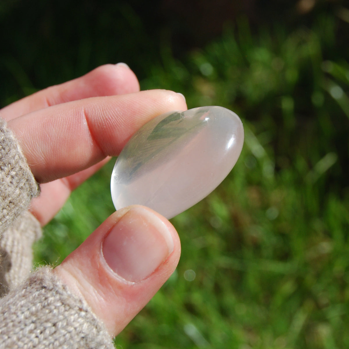 Girasol Clear Quartz Heart Shaped Crystal Palm Stone