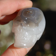 Load image into Gallery viewer, Grey Agate Geode Carved Crystal Skull Realistic Gemstone Carving
