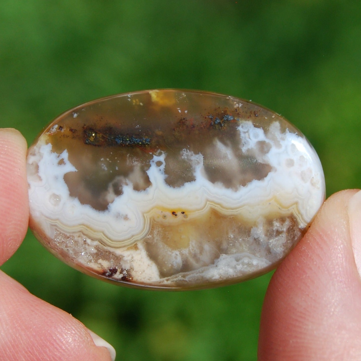 Graveyard plume agate cabochon